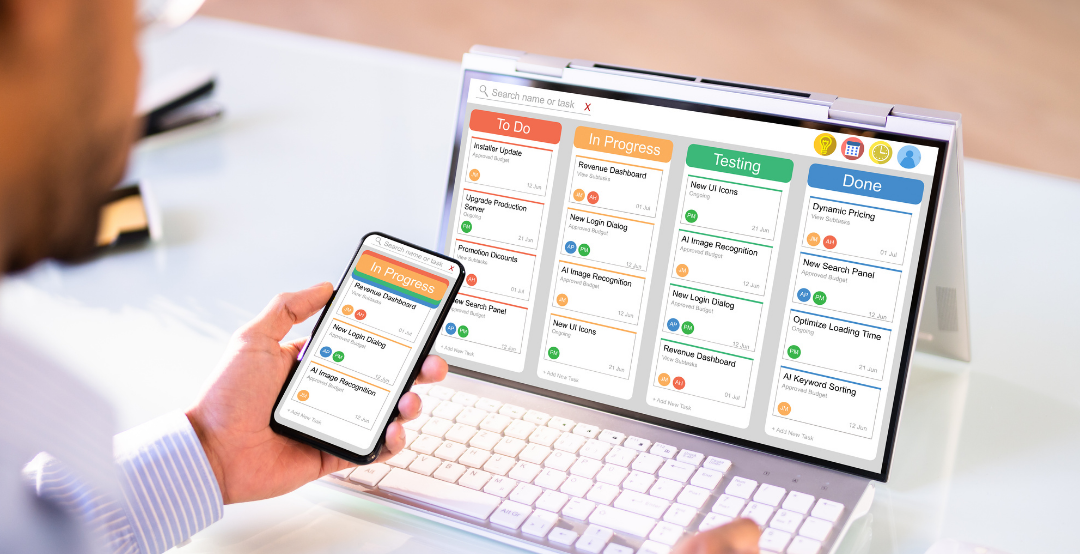 Sales rep using contact management software on mobile device