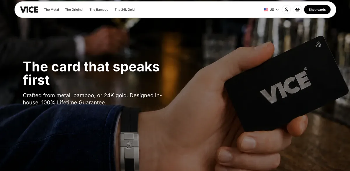 V1CE homepage showing a premium black metal NFC business card held in hand
